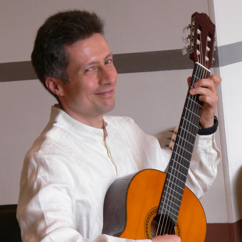 Miguel Ángel Franco Martín is a guitarist and musician with a degree in music pedagogy from the Universidad Pedagógica Nacional. He studied recorder, modern harmony, arranging, orchestration, choir and orchestra conducting. Miguel is a teacher, director of vocal and instrumental groups. He studied classical guitar with Jaime Arias Obregón, Gentil Montaña and jazz guitar with Gabriel Rondón. He trained in the Suzuki method with Marilyn O'Boyle, Bill Kossler, MaryLou Roberts and Diana Chagalj. Since 2005, he has been teaching Suzuki guitar in his school "Ad libitum Escuela de Guitarra".  He has also been a professor at the Universidad el Bosque, choir and orchestra director at the Fundación Batuta, Fundación Música en los Templos and Colegio Nuestra Señora de Fátima de la Policía Nacional.